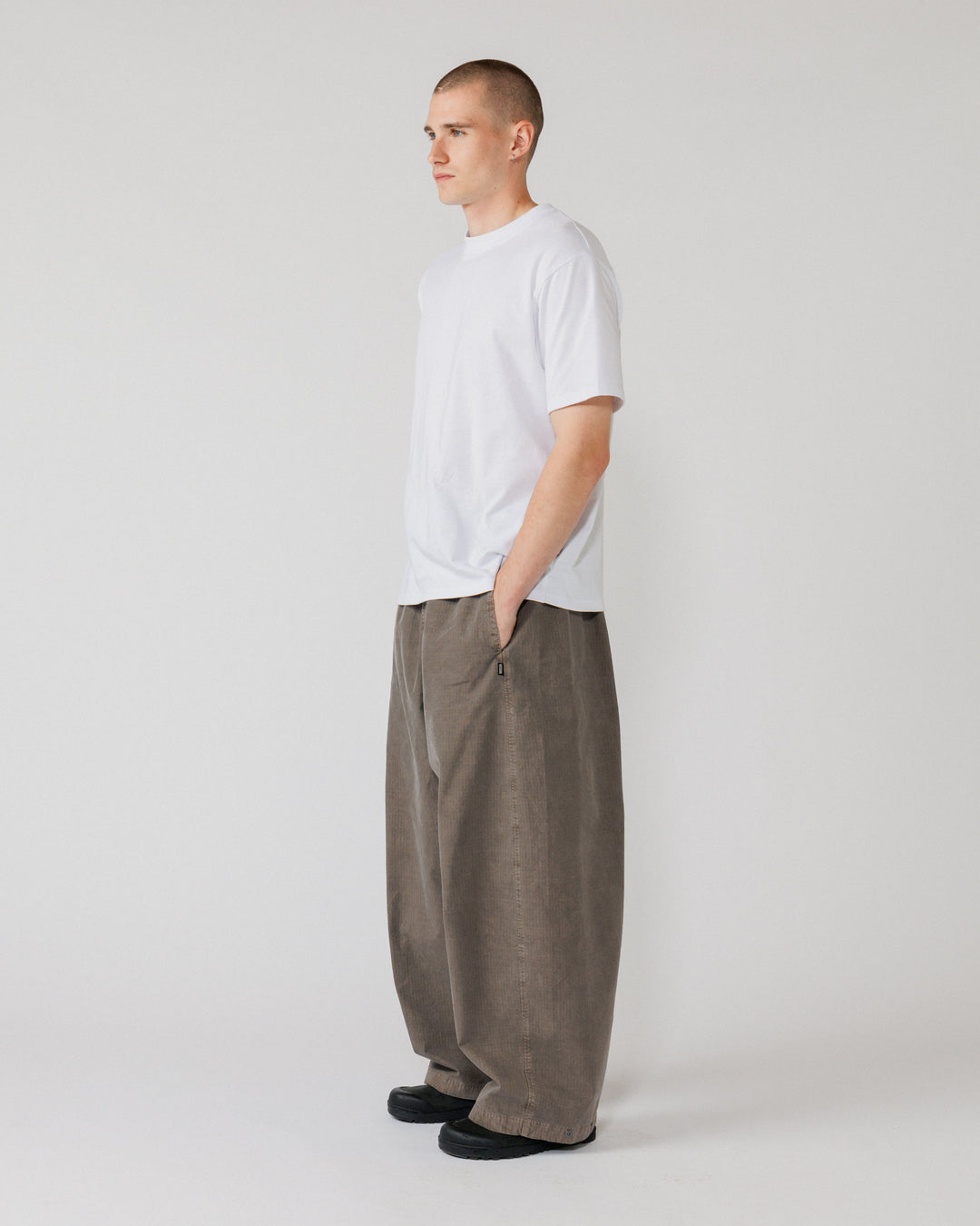 Garment Dyed Atlas Pants - Fawn Brown — 3/4 angle shows volume