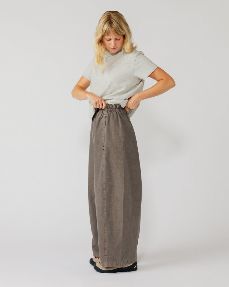 Garment Dyed Atlas Pants - Fawn Brown — action shot, elastic waist shown