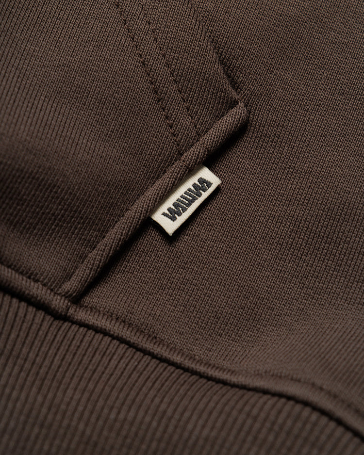 Heavyweight Two-Way Zip Hoody - Chocolate Brown — Hem label branding detail