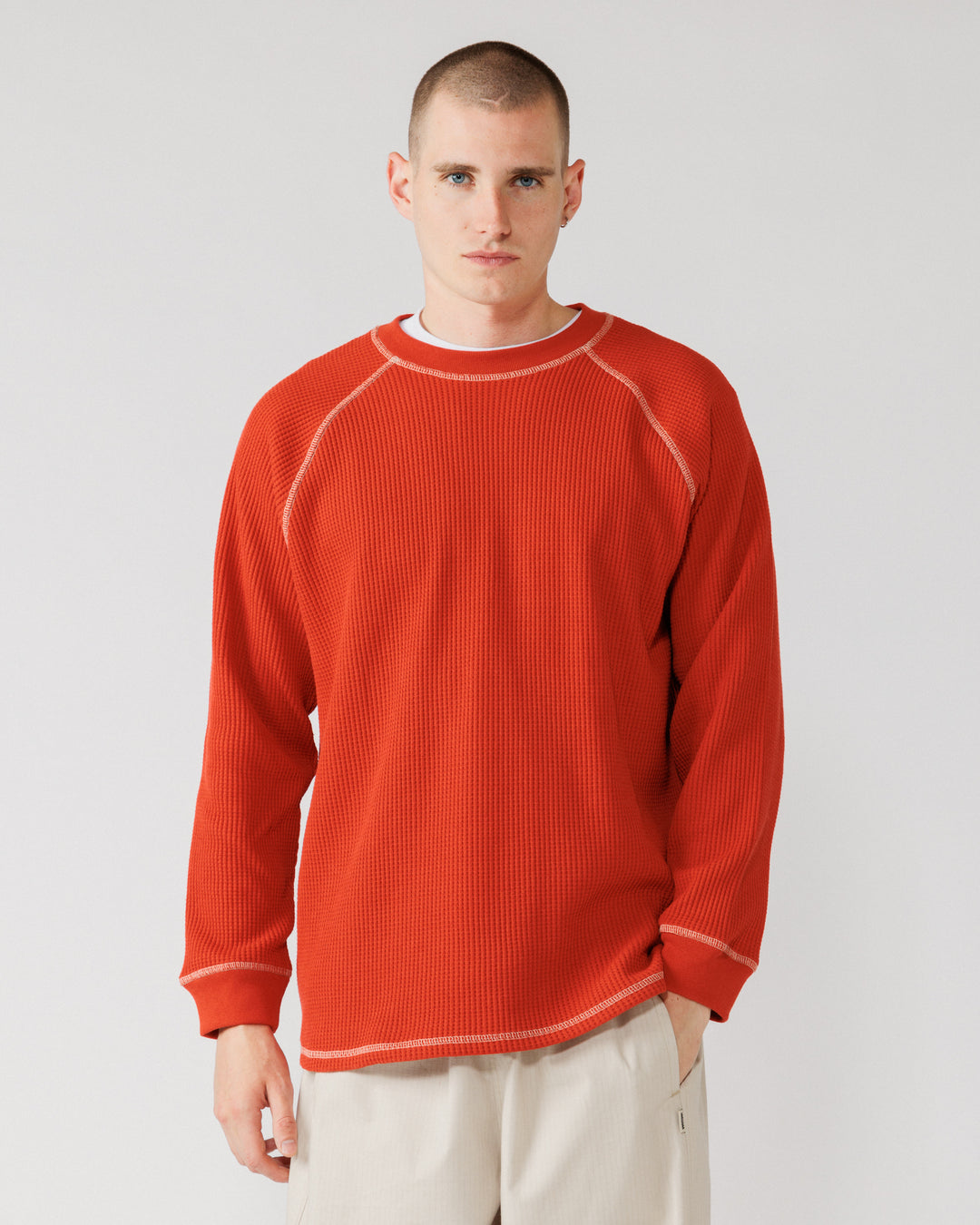 Raglan Range Waffle Knit - Signal Red w Ecru — hero front, knit fills frame