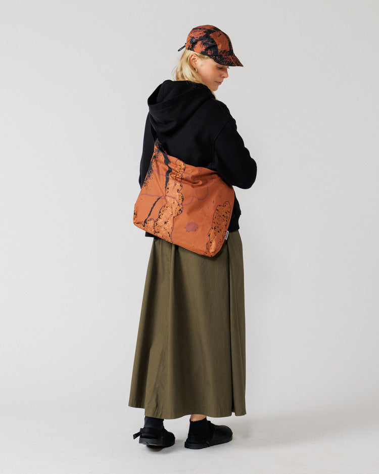 Water Resistant Messenger Bag - Abstract Brick Camo — full-length back view, scale