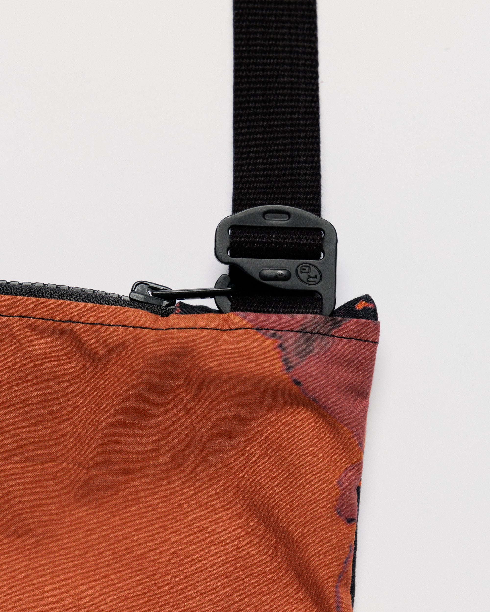 Water Resistant Messenger Bag - Abstract Brick Camo — buckle, strap, zip hardware
